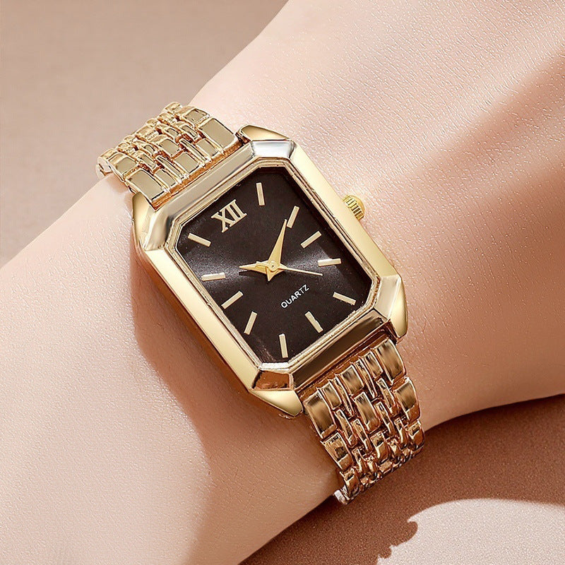 The Lady Is Just Wearing A Square Quartz Watch